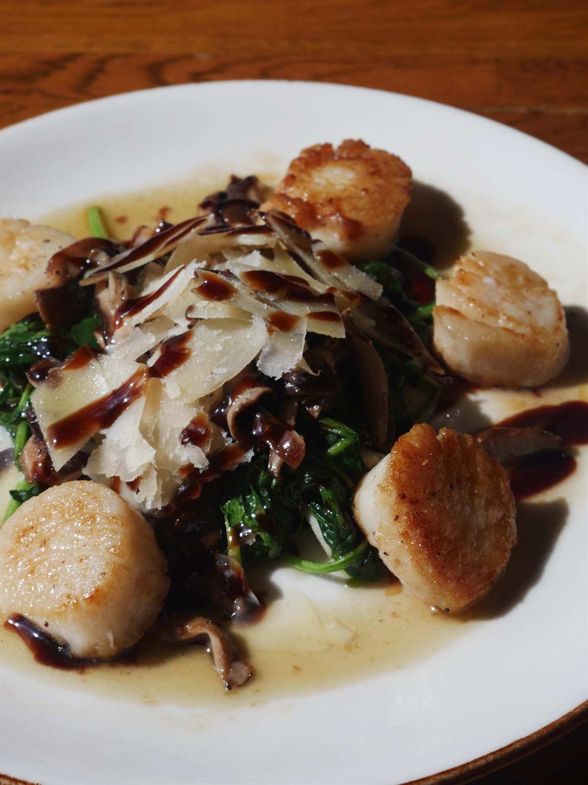 Bocca scallops plated for a catered dinner